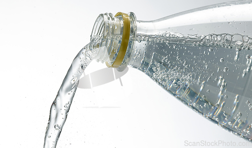 Image of water pouring from bottle