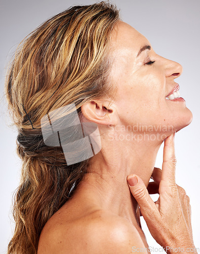 Image of Skincare, beauty and profile of senior woman isolated in studio on gray background. Happiness, healthy skin and wellness model for skincare products, dermatology care and anti aging beauty products