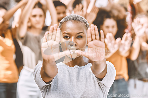 Image of Protest, stop hands and black woman with people .fighting for peace, end to racial discrimination or freedom. Politics, justice or rally, activism or group demand social change or human rights.