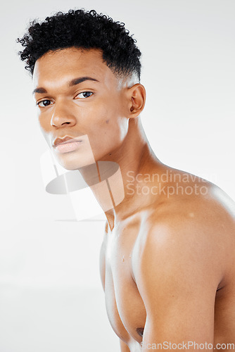 Image of Black man, beauty portrait and cosmetic skincare for healthy lifestyle motivation. Young African American nude, facial care health and natural black skin wellness therapy in white studio background