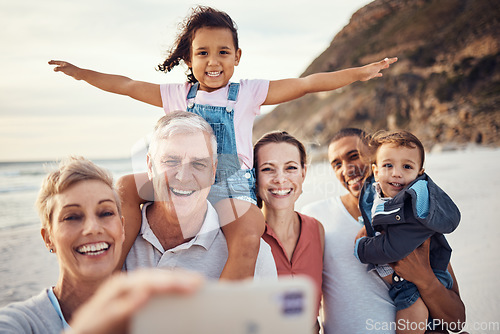 Image of Beach, selfie and happy big family on vacation together in summer by seaside in Australia. Happiness, grandparents and parents with children taking picture with smile on phone while on travel holiday