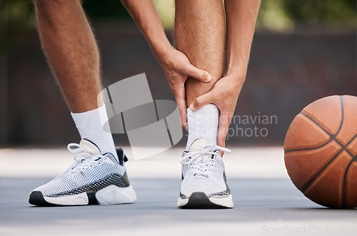 Image of Legs, pain and sport injury with basketball and athlete on basketball court outdoor with emergency and fitness. Basketball player hurt, shoes and exercise with accident during match and workout.