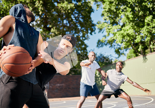 Image of Basketball, friends and teammates on basketball court training for team game together for health fitness, group exercise and competition workout. Outdoor sports, teamwork and motivation to win match