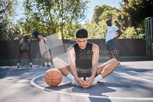 Image of Basketball, man and meditation with yoga, zen and calm mindset before training, exercise or game outdoor. Fitness, workout and wellness young gen z basketball player spiritual and meditate on court