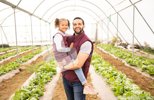 Image of Agriculture, greenhouse farming and man with child at sustainable startup farm. Sustainability, growth and small business, dad agro farmer with happy girl in nursery with lettuce for community food.
