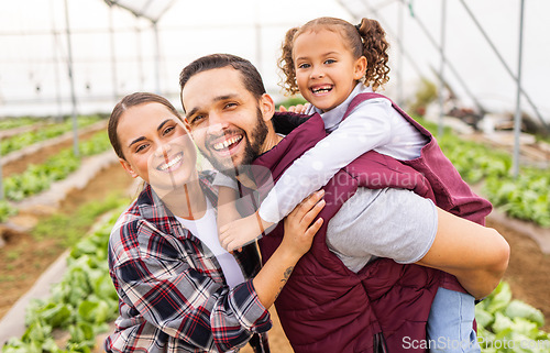 Image of Farm, family and portrait of happy agriculture parents with their child after produce harvest. Parents, mother and father with their daughter bonding with love and care in a sustainable garden