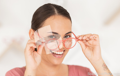 Image of Woman, glasses and portrait of shopping for spectacles in ophthalmology store for health and wellness. Care, retail and young female buying and trying eyewear and eyeglasses while in a optics store