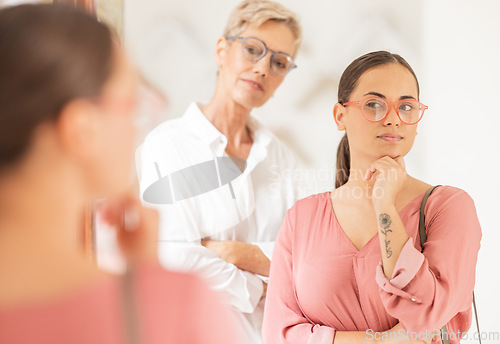 Image of Eyes, woman and glasses by optometrist for vision, shopping and eye test with customer at optician. Eye care, eyeglasses and women consulting for frame, fit and prescription lens by ophthalmologist