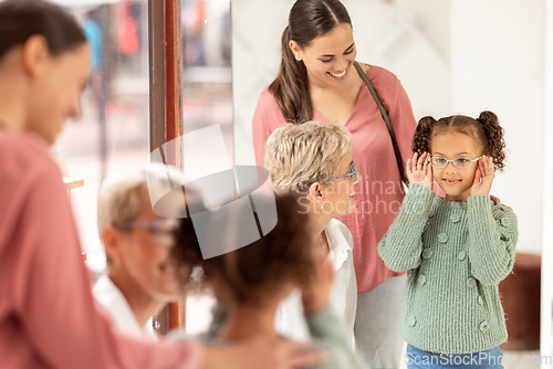 Image of Girl with glasses, healthy eyes and optometrist office for clear vision, quality lenses and good eyesight. Friendly senior woman optician, optometry and ophthalmologist doctor for eyeball healthcare