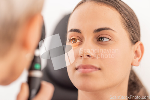 Image of Test, eyes and woman in vision medical consultation with optometrist for eye health and care. Ophthalmology, optometry and optical exam in healthcare office with light in doctor appointment