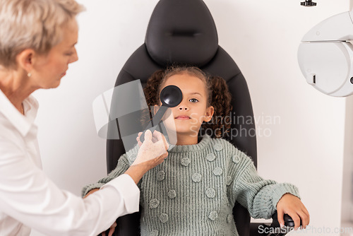 Image of Eye exam, child and optometrist testing eye sight for glasses, blindness and new lense. Vision test, blind girl and kid in chair of professional ophthalmologist, corrective lenses and optician office
