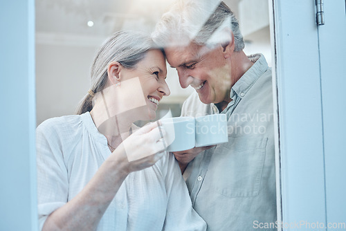 Image of Senior couple, happy and love with coffee on a weekend morning at home. Weekend, laugh and smile, elderly woman and man relax with drink in home. Romance, happiness and drinking sweet tea together