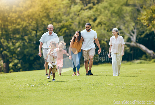 Image of Grandparents, parents and children walking in park, happy and bonding outdoor, loving together and quality time. Family, love and vacation in summer with smile, laugh and have fun with kids and relax