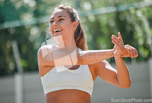 Image of Fitness, sports and woman doing a stretching her arms before a workout or training outdoor in nature. Health, wellness and girl athlete doing a warm up exercise for her muscles, joints and body.