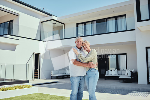 Image of Real estate, couple and happiness of people with a new house property purchase outdoor. Portrait of happy, smile and marriage of a senior man and woman together in retirement smiling with a hug