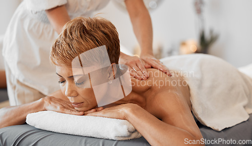 Image of Relax, massage and spa with back of old black woman for wellness, skincare and health. Peace, vacation and luxury with elderly lady and massage therapist in hotel resort for holiday and beauty