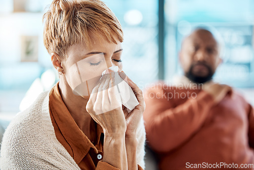 Image of Crying, divorce and upset black couple on sofa sitting separate from each other. Hurt, suffering and sad black woman with tissue, emotional after fighting, arguing and end relationship with husband