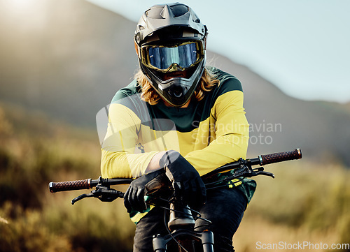 Image of Dirt bike, bicycle and athlete portrait to ride in competitive cycling competition for adventure. Extreme sport, moto and rider waiting for cycle sport and activity for fitness and health