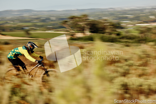 Image of Mountain bike speed, race motion blur and extreme sports outdoor on dirt track in nature for competition. Bicycle man ride, cycling adventure and action danger and fast athlete to win contest in bush