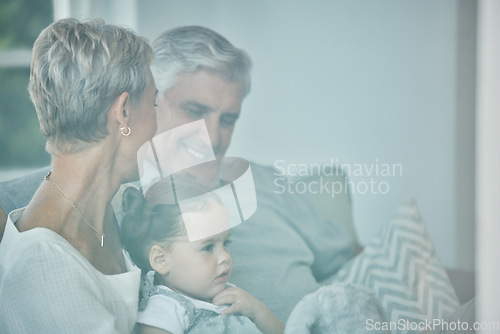 Image of Grandparents, girl and hug with family relax, love and care on lounge sofa in home. Smile, play and happy children, senior grandma and elderly grandpa bond together for quality time on a house couch