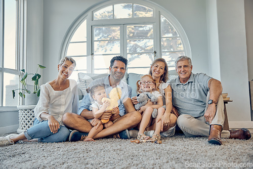 Image of Family, love and generations together in family home, happy in portrait for quality time and bonding. Care, smile and grandparents with parents and children in living room, big family and happiness.