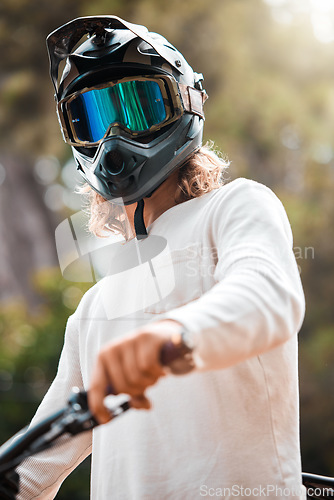 Image of Helmet, off road and cycling portrait of man ready for ride with safety sport gear and glasses. Nature, exercise and bicycle wellness person with protection equipment for outdoor adventure.