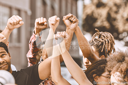 Image of Justice, freedom and hands of people in protest city with community for support, change and world peace. War, government and global power with fist of crowd for activism fight, society or revolution