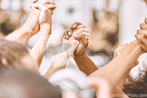 Image of Prayer, hands and people in support of worship, god and religion while holding hands and bonding outdoors. Community, peace and praying by friends with diversity, love and spiritual praise together