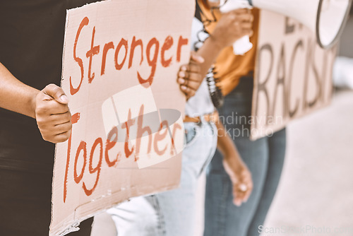 Image of Protest, sign and equality with a group of people holding cardboard during a rally or march for freedom. Street, community and justice with a crowd fighting for human rights or a politics campaign