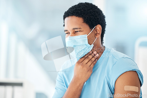 Image of Man, covid face mask and sore throat in hospital with vaccine plaster, bacteria infection or healthcare crisis. Black person, pain and sick with covid 19 virus in medical clinic, pharmacy or lockdown