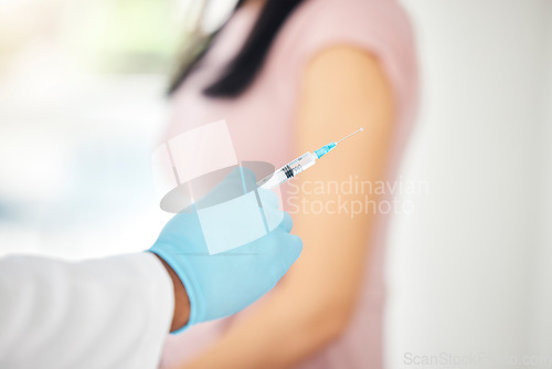 Image of Vaccine, covid and healthcare, hand and syringe needle with medicine, doctor with patient in hospital for virus immunization. Health, safety and protection glove, covid 19 and medical injection.