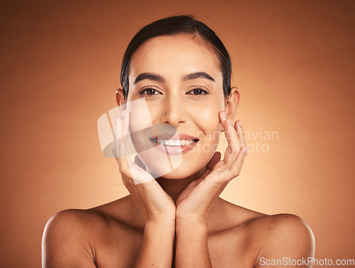 Image of Portrait, skincare and woman in studio for beauty, facial and grooming against orange background mockup. Face, skin and girl wellness model smile, relax and happy with cosmetic product results