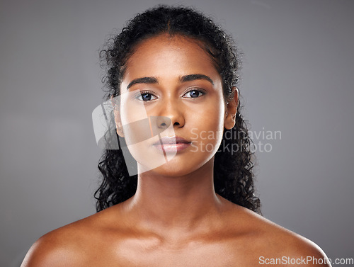 Image of Face, beauty and skincare of a woman from India with glowing, wellness and skin health. Portrait of a young Indian person after a cosmetic, dermatology of glowing body treatment looking radiant