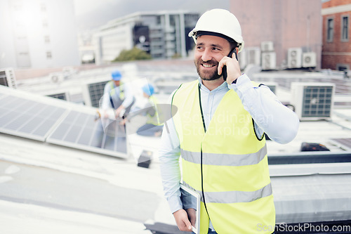 Image of Builder, solar panel and construction man and phone call for communication and building project. Construction worker, cellphone and conversation for architecture and industrial strategy outside