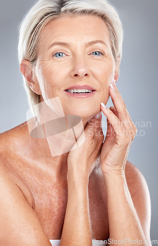 Image of Beauty, skin and skincare with woman in antiaging portrait, face treatment and natural cosmetics with grey studio background. Face, facial and cosmetics, mature model with wellness and healthy glow.