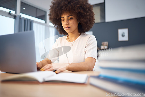 Image of Laptop, black woman and notebook in office with business woman research creative idea at a desk, inspired and motivated. Corporate, innovation and girl with a vision typing, planning and reading