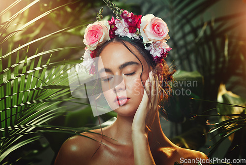 Image of Face, forest and beauty with flower headband in tropical plants outdoors bokeh background. Woman, cosmetic skincare treatment and facial or bodycare makeup with floral pink rose crown in nature