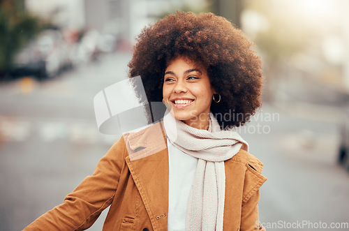 Image of Winter, fashion and black woman in the city street for holiday, travel and happiness in Portugal. Smile, thinking and young African girl happy on a vacation in the road with fall clothes and an afro