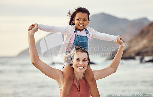 Image of Family, beach and vacation with mother and child outdoor for travel, adventure and bonding in nature for love, support and care. Portrait of woman carrying girl on shoulders by sea after adoption