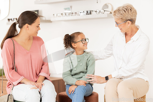 Image of Optometry, glasses and vision with a girl, mother and optician meeting for an appointment or checkup in an optometrist office. Family, kids and eyewear with a woman and daughter at an ophthalmologist
