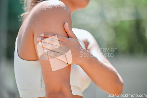 Image of Sport injury, arm pain and woman athlete hand holding a muscle after a sports accident or strain outdoor. Bruise, medical emergency of injured arms after a exercise workout, training or fitness