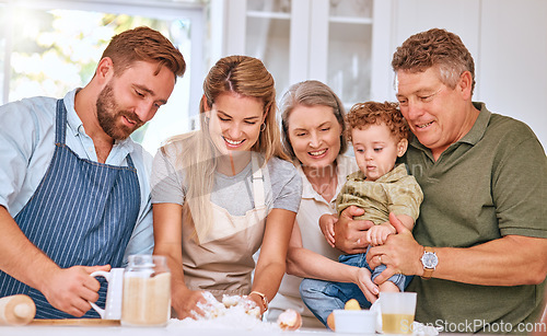 Image of Grandparents, parents and kid baking, happy and being loving together in kitchen. Family, cooking and smile with happiness, spend quality time and have fun while bonding, make food and meal at home.