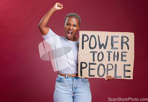 Image of Black woman, protest and poster for human rights, power and equality or asking for change and freedom to stop racism. African female shout, fight and vote while holding cardboard sign and fist