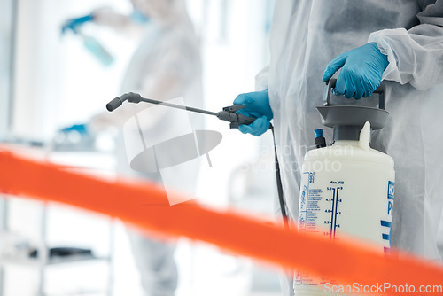 Image of Covid disinfection, red tape and man in hazmat suit to safety protect from corona virus while cleaning hospital clinic. Contaminated science laboratory, medical ppe or healthcare worker sanitize room