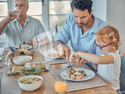 Image of Restaurant, daughter and father with cutting, food or meat on table for learning, teaching and help. Dad, girl and lunch together with fork, knife and plate and helping kid with meal with family