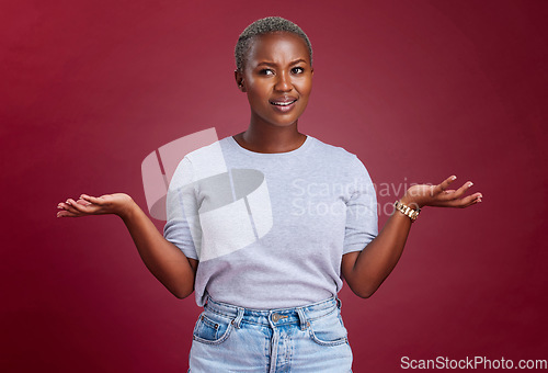 Image of Confused, question and why black woman on studio red background, body language and facial gesture for risk decision, shrug and reaction. Uncertainty, unsure and frustrated model, doubt and confusion