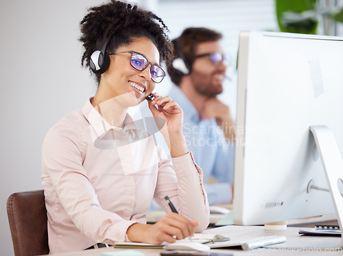 Image of Call center, black woman and customer service on computer, consulting agency and contact us, help and telemarketing company at office desk. Happy consultant, sales worker and business communication