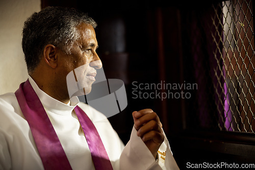 Image of Religion, church and priest in confession booth listening to people confess, share and speak about their sins, mistakes and ask forgiveness. Christianity, catholic tradition and man ready to listen