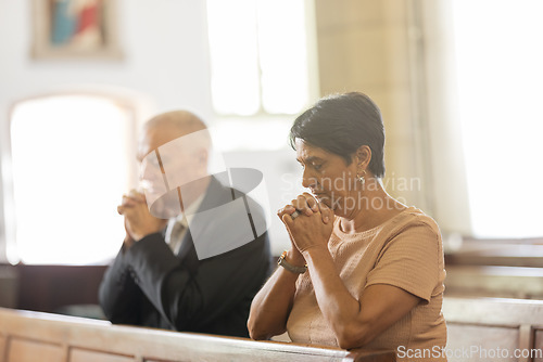 Image of Senior couple, christian and pray in church, religion and spiritual for help, respect and thank you to God in service. Elderly man and woman in prayer, praying and faith in chapel, service and trust