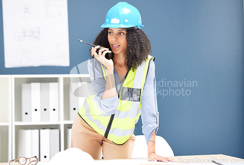 Image of Black woman architect or construction worker with walkie talkie for communication or networking in office. Engineer, manager or creative architecture girl talking or project management discussion